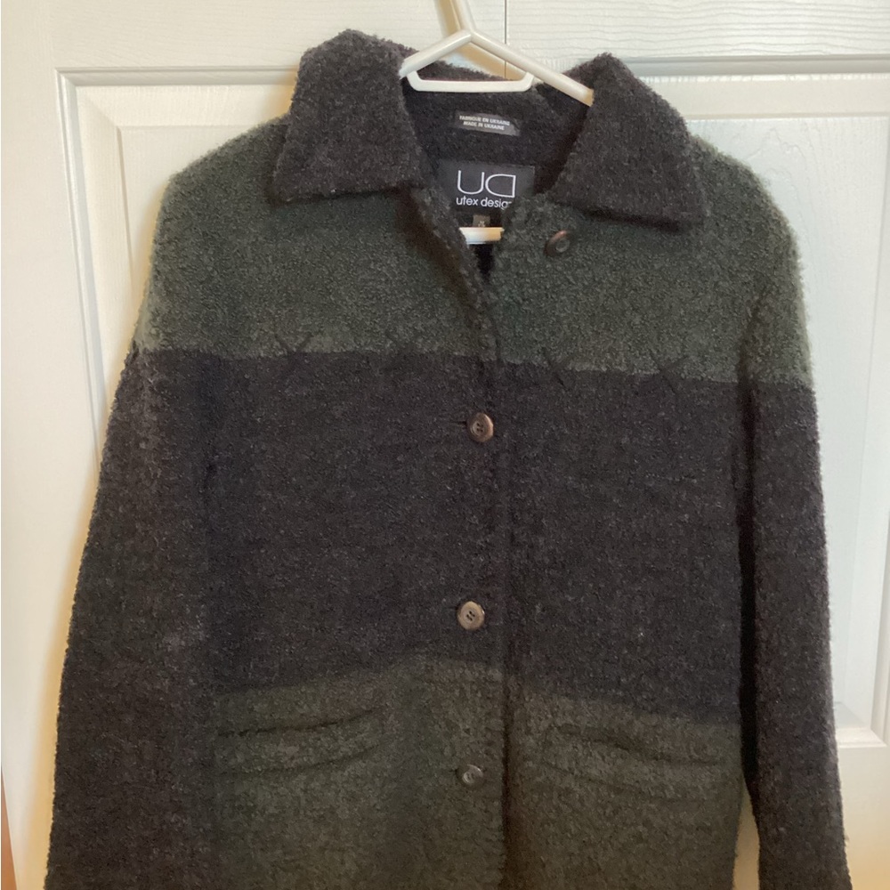 A size medium women’s jacket. 80% wool and 20% nylon.